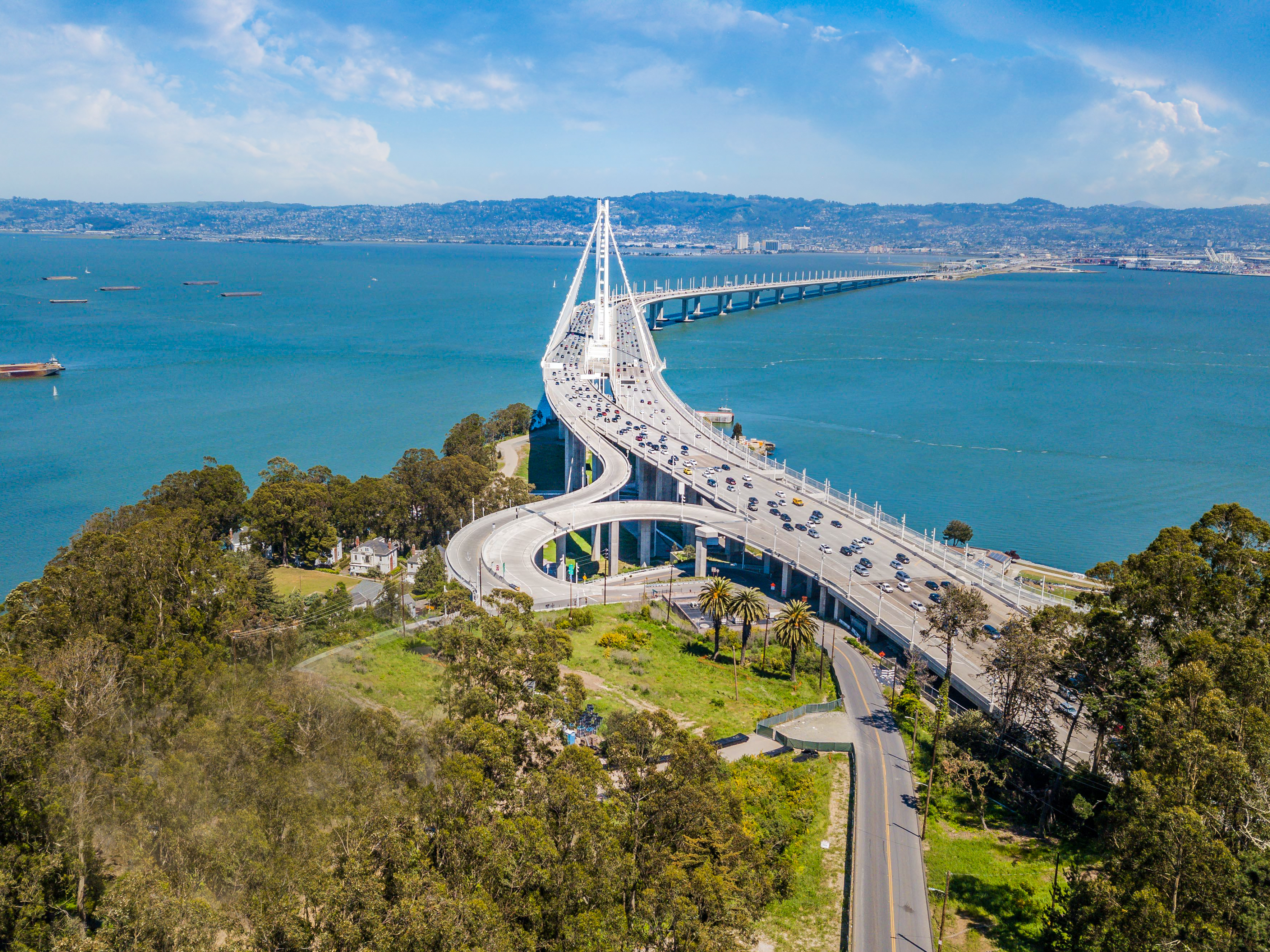 An aerial view of the Bay Bridge on a sunny day. A view from Treasure Island looking across the bay...