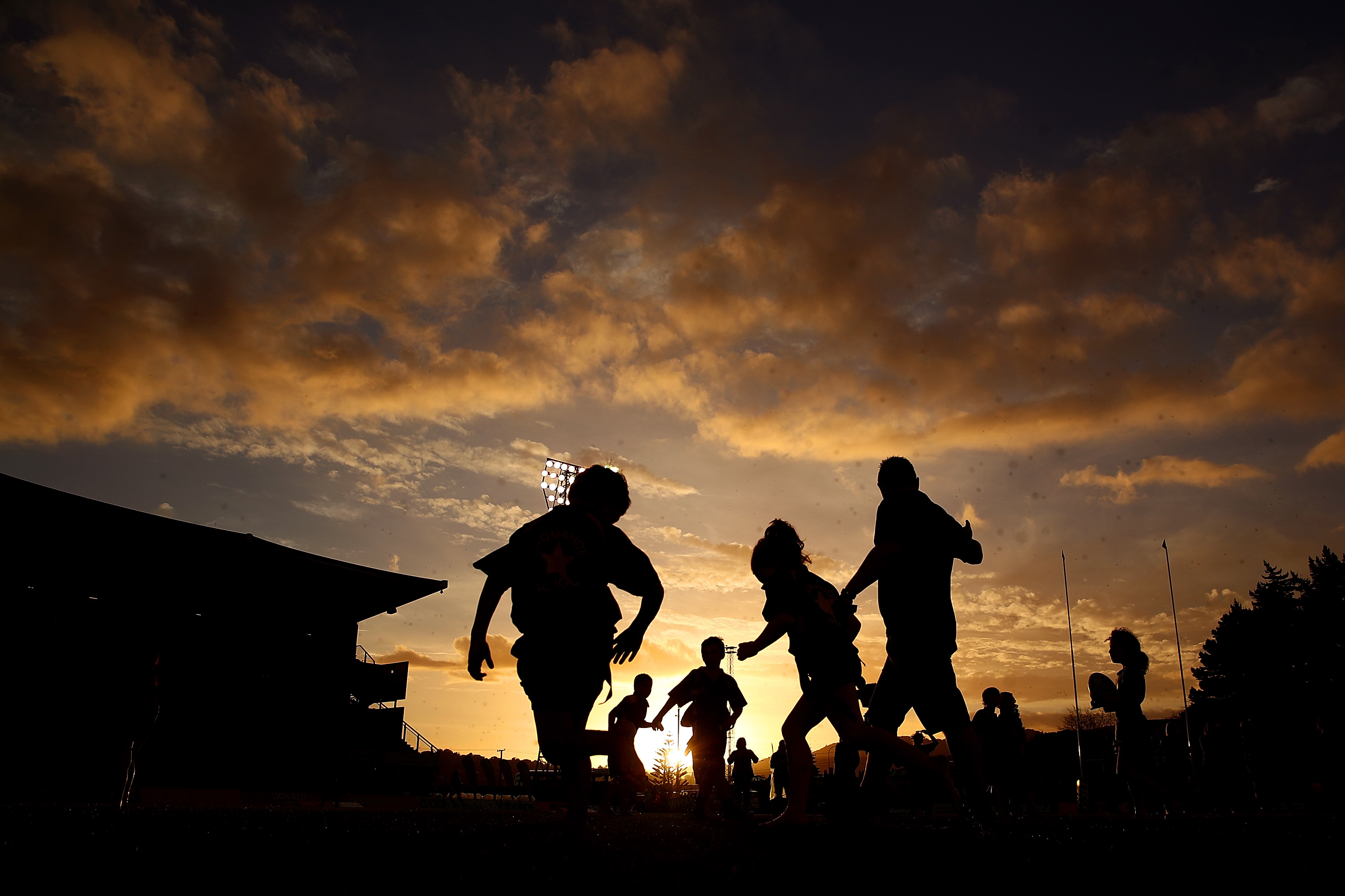 WHANGAREI, NEW ZEALAND - SEPTEMBER 27:  Children play Rippa Rugby before the round seven Mitre 10 C...