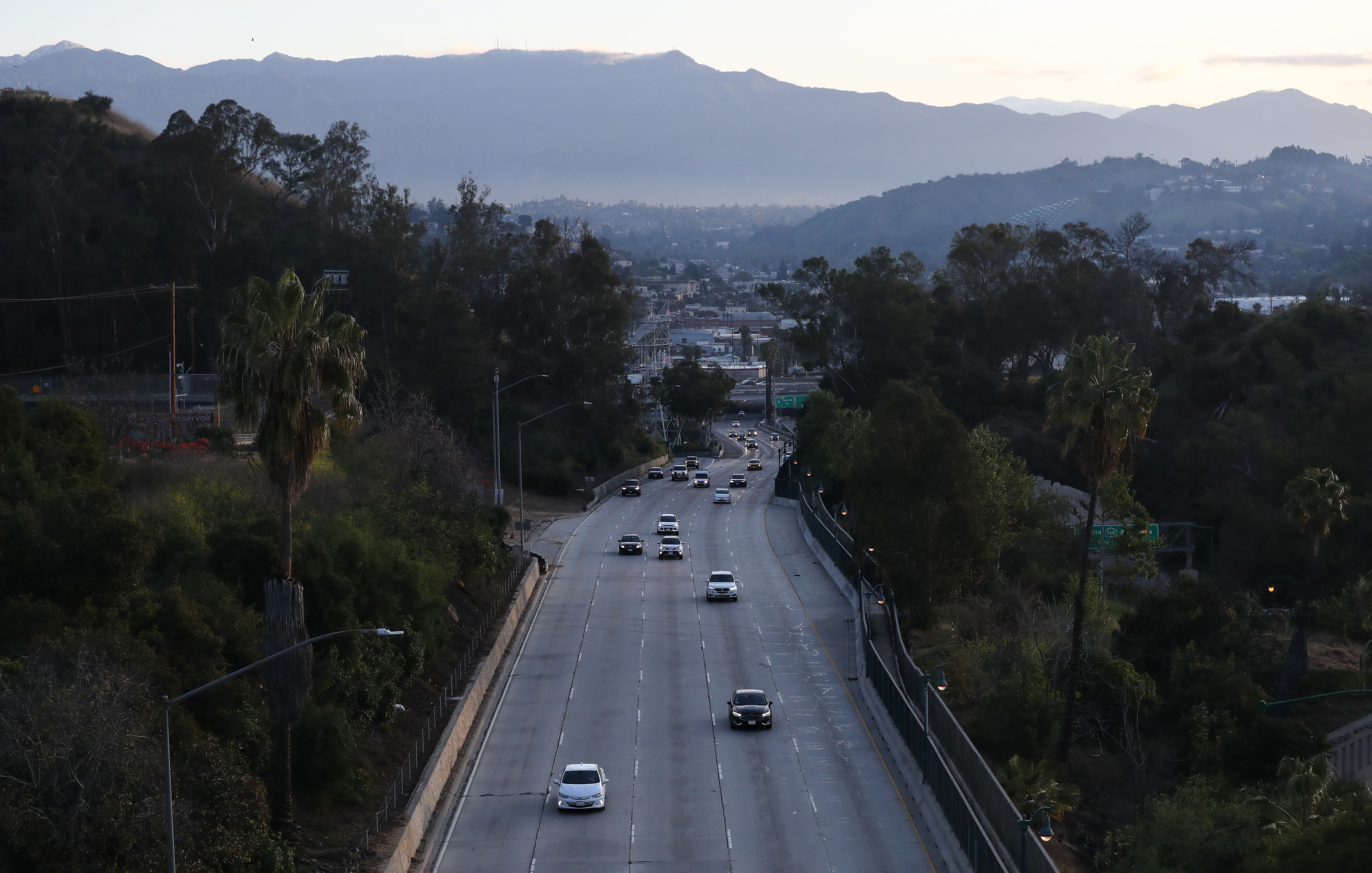 LOS ANGELES, CALIFORNIA - MARCH 20: Cars head downtown on the 110 Freeway during lighter than norma...